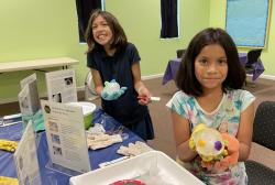 Students Proudly Display Ice Orbs from this Family Science Night Activity