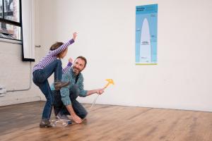 Family enjoying Stomp Rocket activity