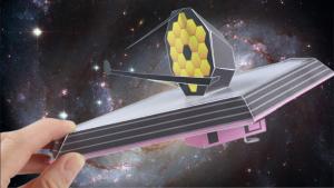 Webb Telescope asy to build paper model held in a hand