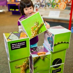 Young girl using Build a Giant Nano Puzzle