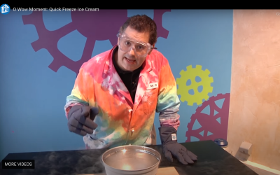 Nano ice cream activity Mr. O video schreenshot showing presenter wearing safety goggles and gloves