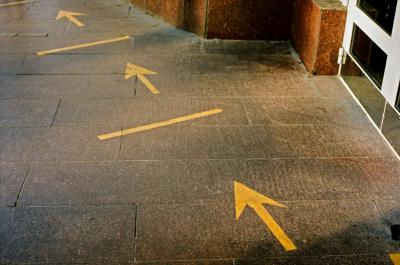 Navigating uncertainty sequence of arrows on the street. 