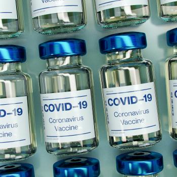 COVID vaccine image credit Daniel Schludi on Unsplash