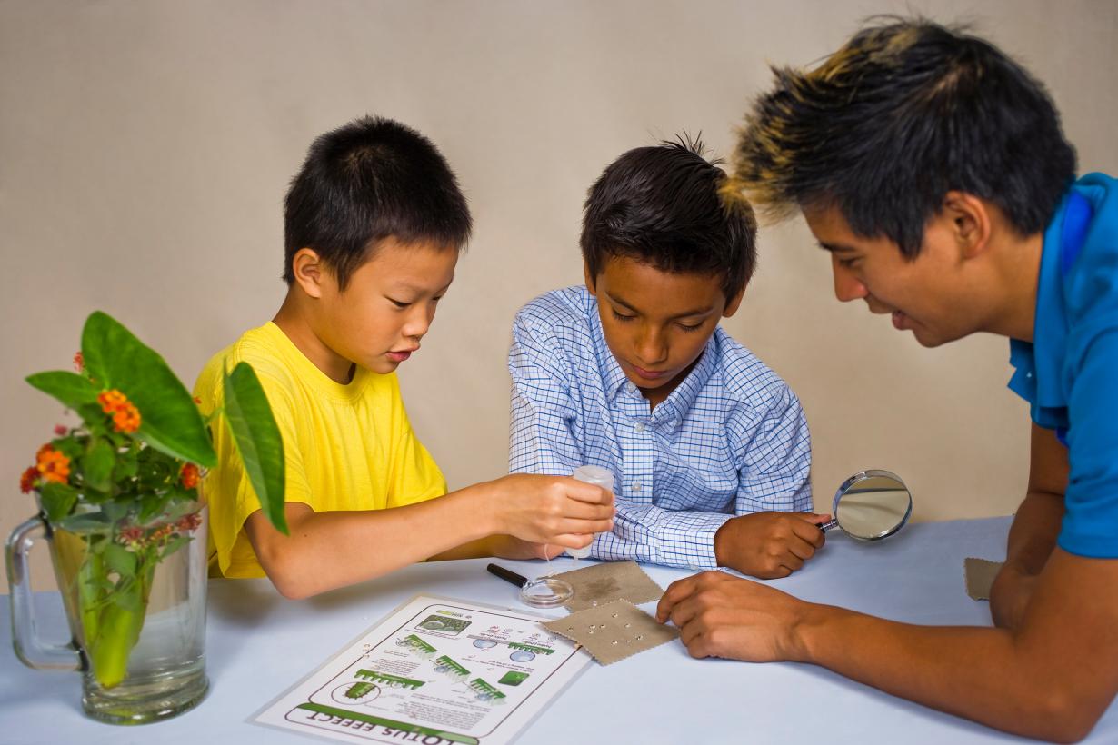 Learners looking at a nano experiment