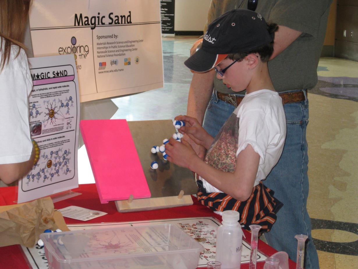 Learner experimenting with magic sand