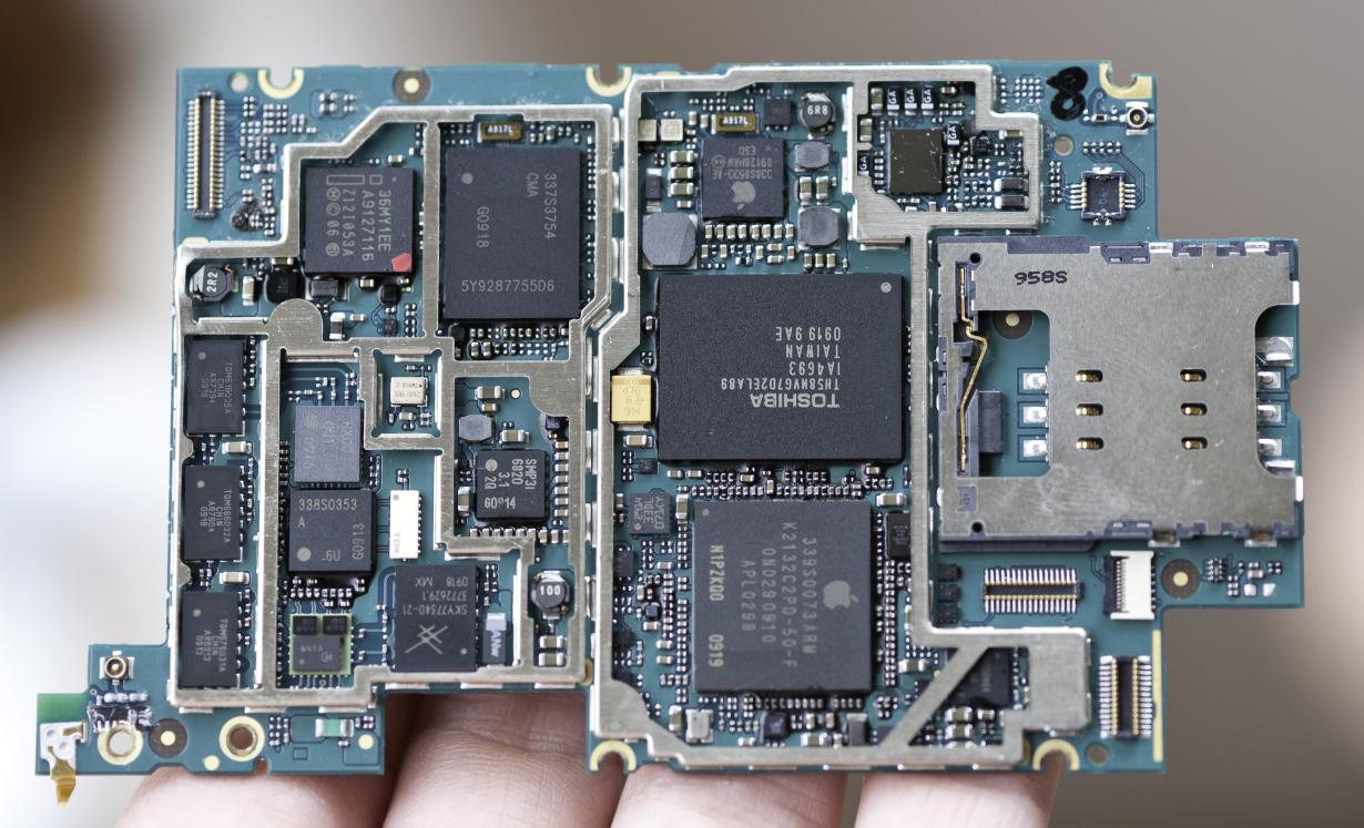 Photograph of an Apple iPhone motherboard.