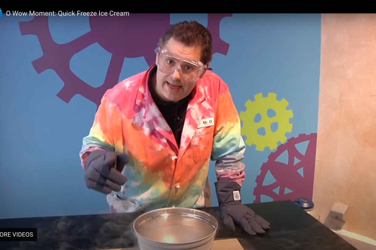 Nano ice cream activity Mr. O video schreenshot showing presenter wearing safety goggles and gloves