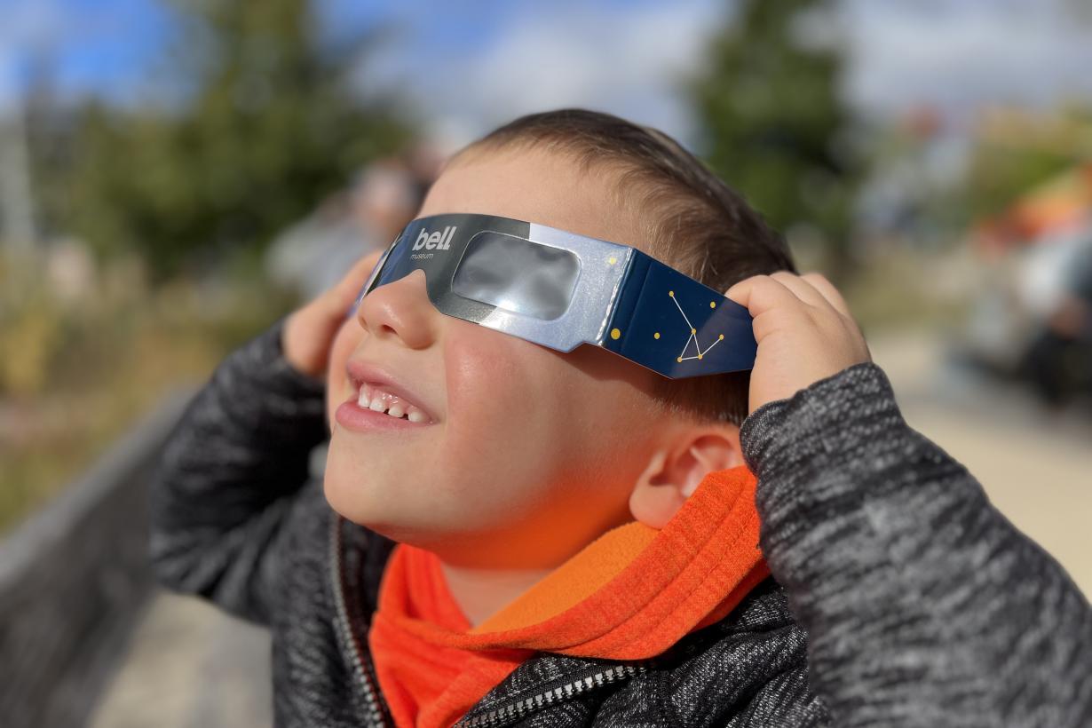 2023 Annular Eclipse_Child Viewing Outside The Bell Museum StPaul MN.jpg