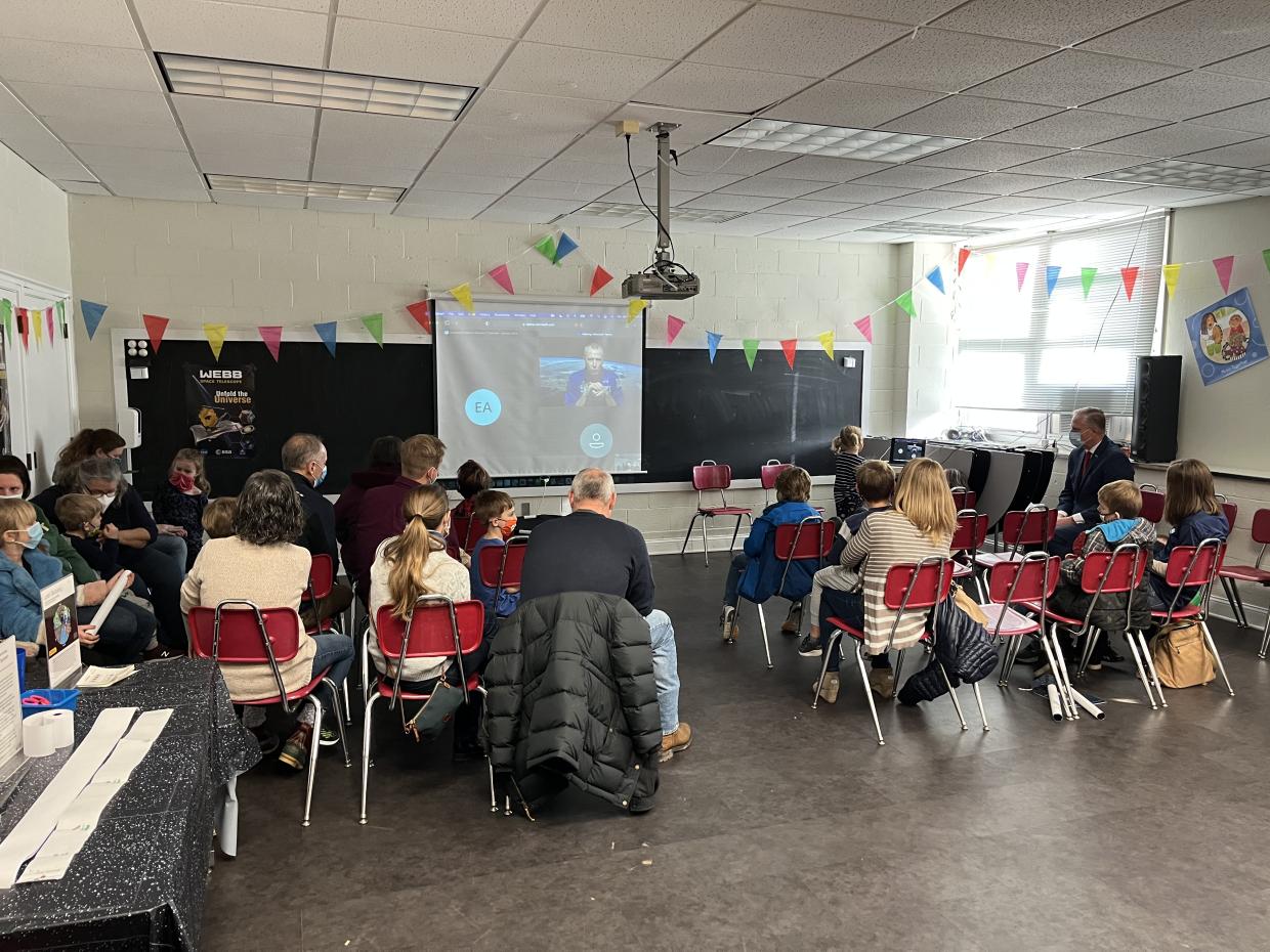 Lewisburg Childrens Museum children interacting on video with astronaut Andrew Feustel after being introduced by U.S. representative Fred Keller