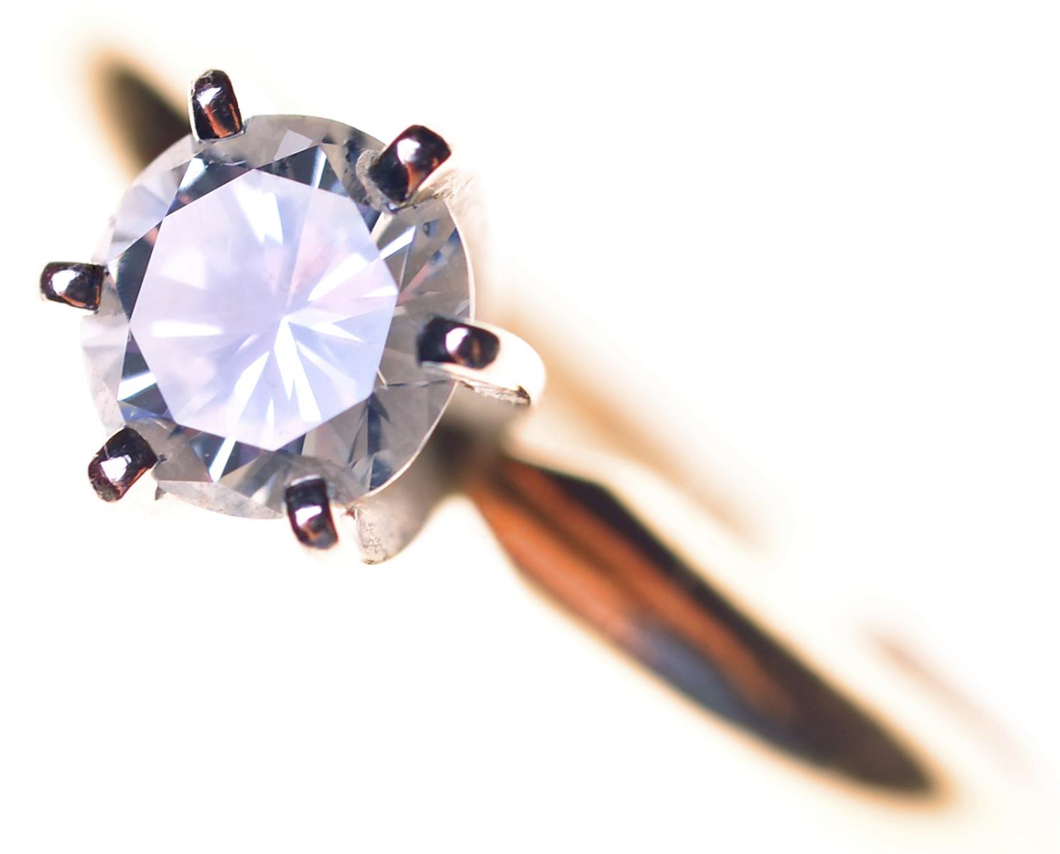 top zoomed in view of a diamond ring