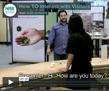 Computer screenshot of the How to Interact video featuring a man in a blue shirt walking to a museum educator 