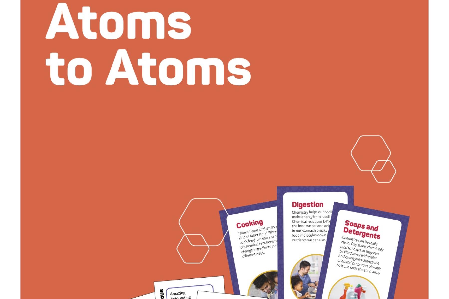 Image of the table sign for Atoms to Atoms card game