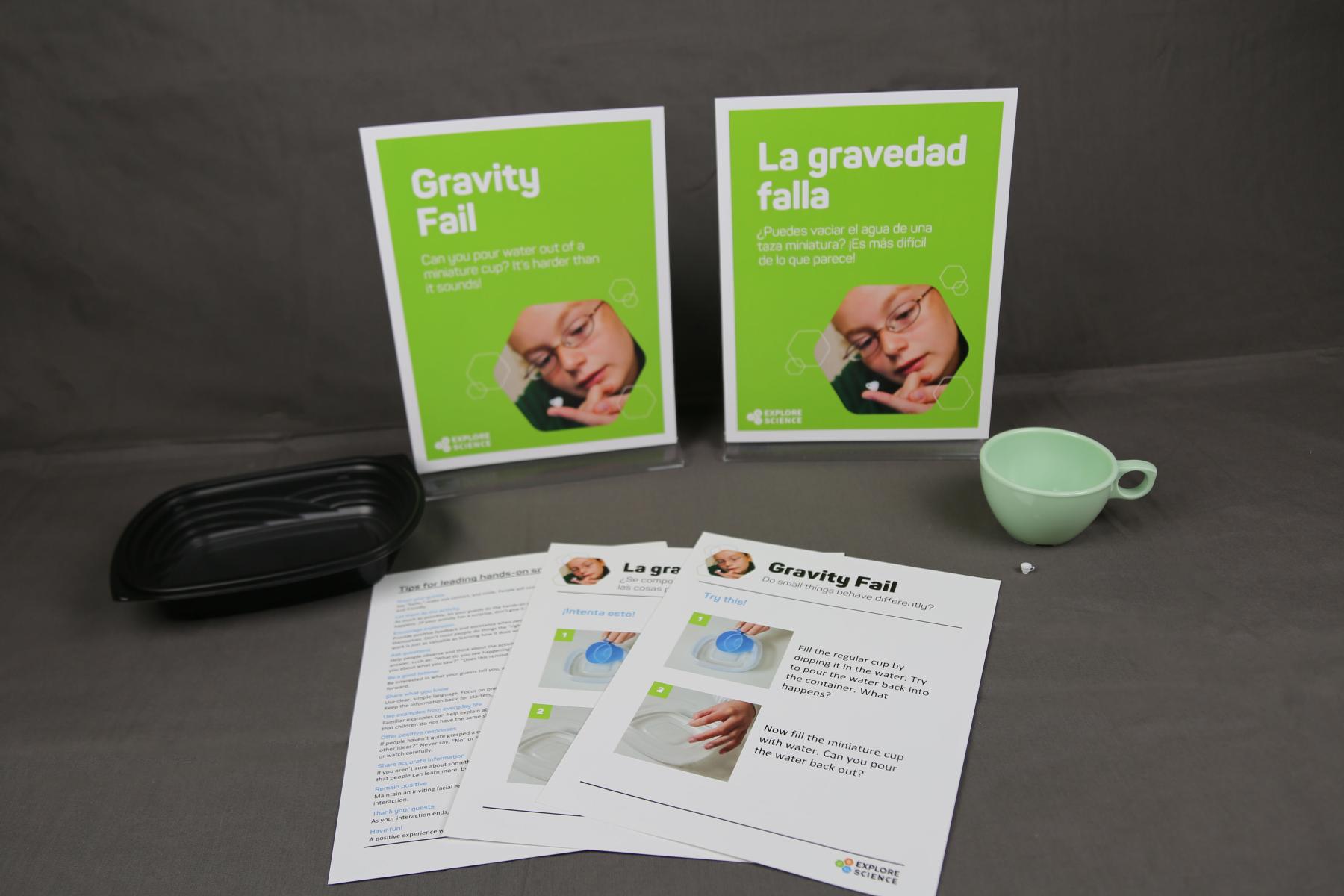 Materials in the Zoom into Nano Gravity fail kit including full-size and dollhouse sized teacups