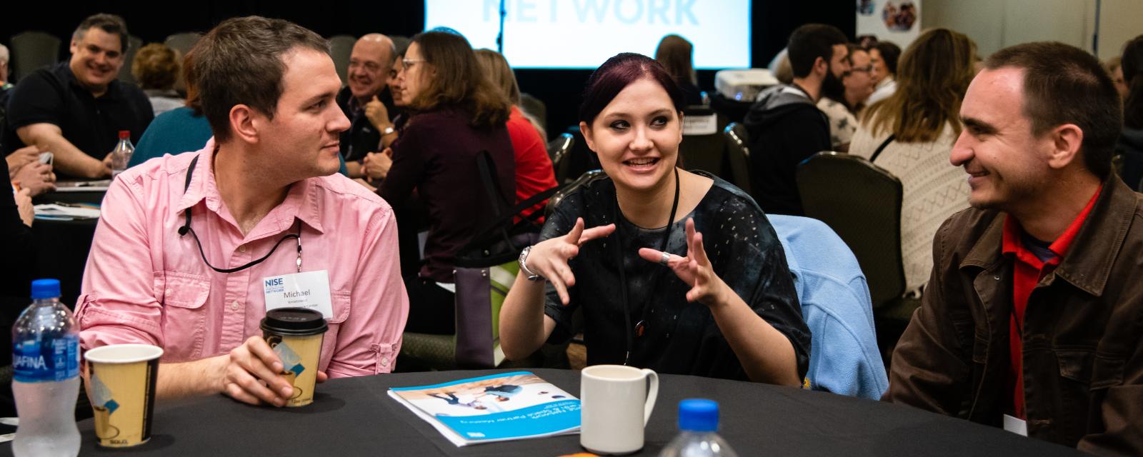 Professional talking at a conference 